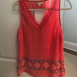 Women’s colorful blouse tank top. Skies are blue